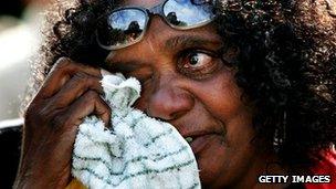 Rita Shillingworth cries as Australian Prime Minister Kevin Rudd delivers an apology to the Aboriginal people for injustices committed over two centuries of white settlement on 13 February 2008