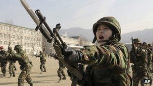 Woman soldier in South Korea, which allows female artillery officers and fighter pilots