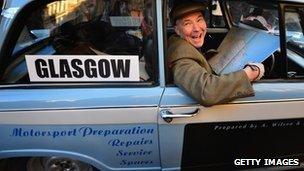 Richard Bartniczek sits in his car with a map