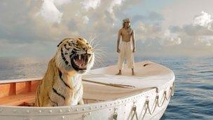 Suraj Sharma with tiger "Richard Parker" in Life of Pi