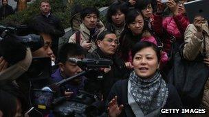 Official outside Guiyang court, China (28 Jan 2012)