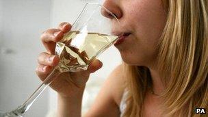 Woman drinking wine