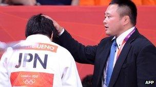 Japanese women's judo head coach Ryuji Sonoda (R) at the London 2012 Olympic Games on 31 July 2012