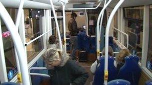 Passengers boarding a Jersey bus