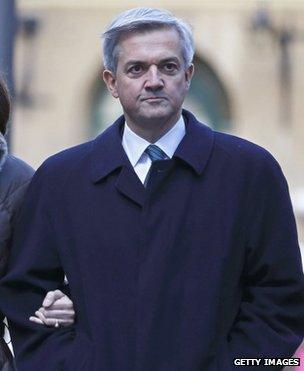 Chris Huhne arriving at court