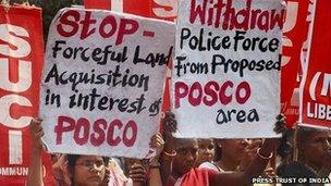 Anti-Posco activists hold up placards during a protest in Orissa