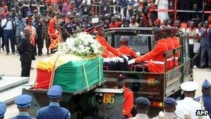 A military cortege with the body of Ghana's late President John Atta Mills on 10 August 2012 in Accra