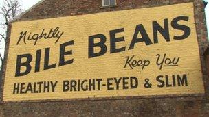 Advertising sign painted on wall in York