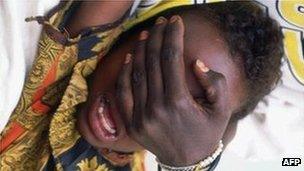 Hudan Mohammed Ali, six, screams in pain while undergoing circumcision in Hargeisa (archive shot)