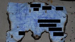 A burnt note found in Ashik Ali's flat