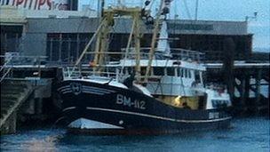 Brixham registered beam trawler in St Peter Port Harbour