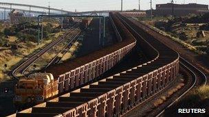 A train loaded with iron ore travels towards the Rio Tinto Parker Point iron ore in western Australia