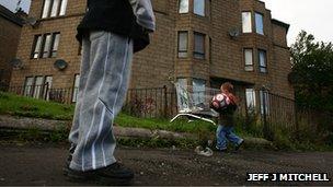 Children playing in run-down street