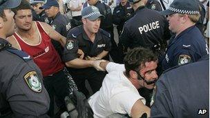 A man is arrested at Cronulla Beach in Sydney, Australia, Sunday, 11 December 2005