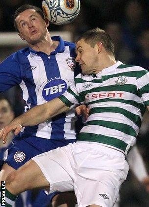 Coleraine's Ruairi Harkin in action against Shane Robinson of Shamrock Rovers