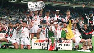 Swansea City players celebrate their Autoglass Trophy win in 1994