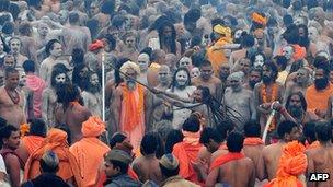 Hindu naked holy men take part in a procession to the Sangam at the Kumbh Mela in Allahabad