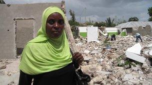 Mealii Ali points out her demolished home