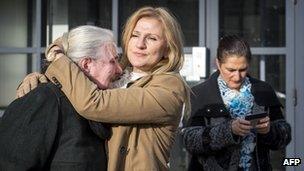 Relatives of victims of the Srebrenica massacre outside court