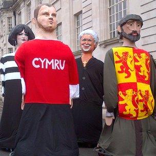 Giant statues in Cardiff St David's Day parade