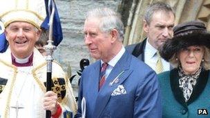 The Prince of Wales and Duchess of Cornwall leave St John church in Cardiff