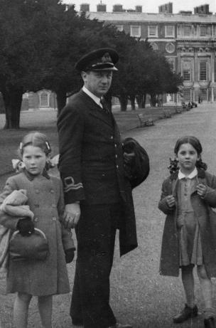 Lieutenant Theo "Rusty" Ionides with his daughters Penelope and Anthea at Hampton Court Palace