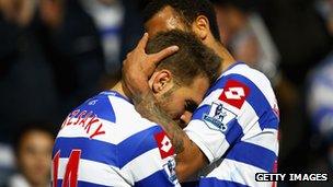 Akos Buzsaky (l) and Anton Ferdinand (r)