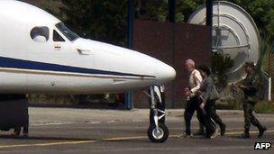 Uwe Breuer (l) at Aguas Claras airport in Colombia