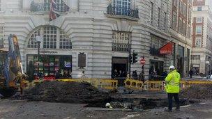 Repairmen in Regent Street on Monday