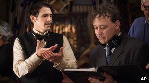 James Franco and Sam Raimi on the set of Oz the Great and Powerful