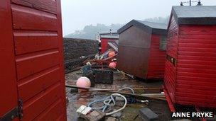 Damaged fishermen's huts at Rozel