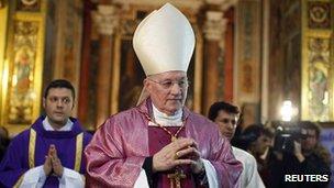 Canadian Cardinal Marc Ouellet leads a procession at the start of a mass at the Santa Maria in Transpontina church in Rome March 10, 2013