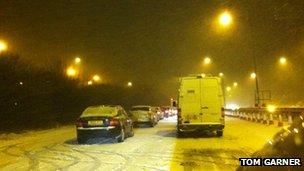 Cars in snow on A26