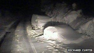 Abandoned cars covered in snow in Guernsey