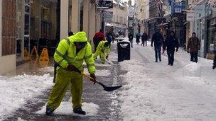 Workers clearing snow in King Street