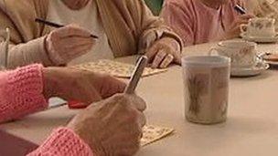 Day care residents playing bingo