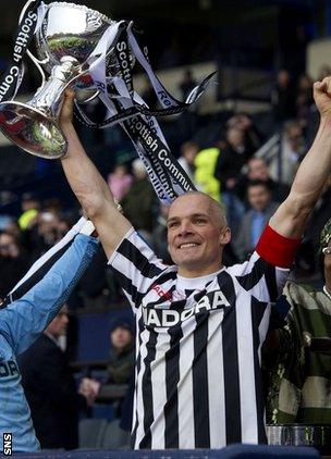 St Mirren skipper Jim Goodwin lifts the League Cup