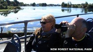 Passengers on a New Forest National Park tour bus in Lymington