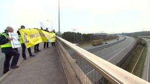 Protest above the M6 Toll motorway