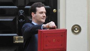 Chancellor of the Exchequer George Osborne holding the Budget box on Budget Day 21/03/2012