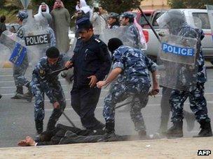 Kuwaiti riot police break up a Bidun protest in Jahra, north-west of Kuwait City, on 6 January 2012