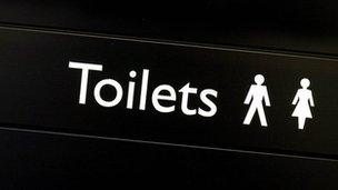 Sign for a public toilet file image