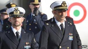 File pic of Italian marines Massimiliano Latorre (R) and Salvatore Girone (L) arriving in Itlay on 22 Dec 2012