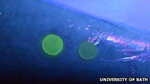 How the fluorescent dye would look on an arm if the wound was infected