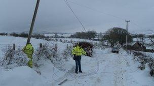 BT workers carrying out emergency repairs