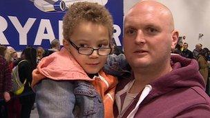 Rob Potts with his son at East Midlands Airport