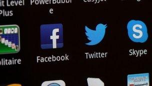 Apps, including Twitter and Skype, on a smartphone