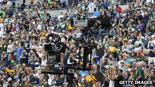 ESPN camera crews in place for an American Football game