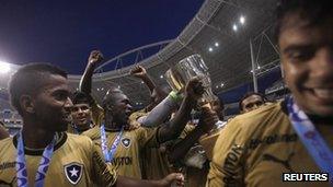 Rio football club Botafogo celebrate a recent victory at the Joao Havelange stadium - now closed over structural problems with its roof