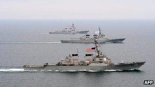 One South Korean and two US navy ships move into formation off the Korean Peninsula during exercise Foal Eagle 2013 in 17 March 2013 image released by the US military